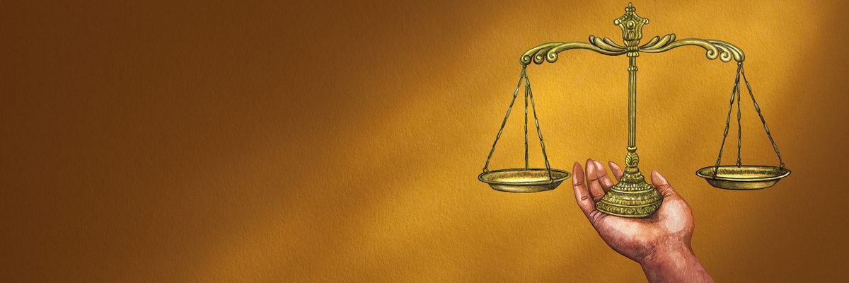 a hand balancing a set of scales