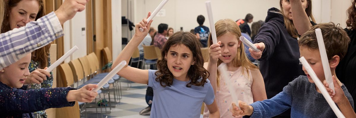 A group of kids acting out a scene