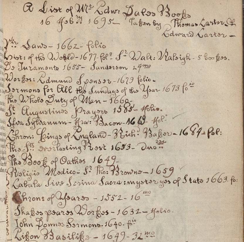 a handwritten list of books in a loopy hand
